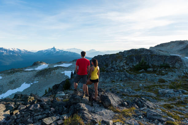 istock Couple on a stunning hike in the mountains 664857532
