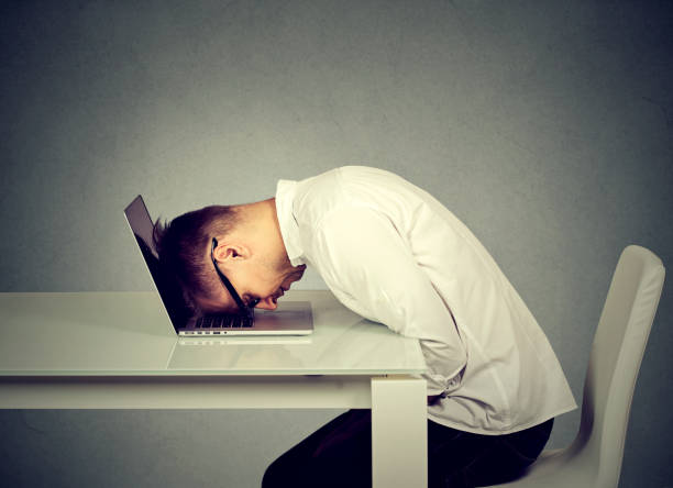 istock young businessman working at his desk using laptop computer 664861556