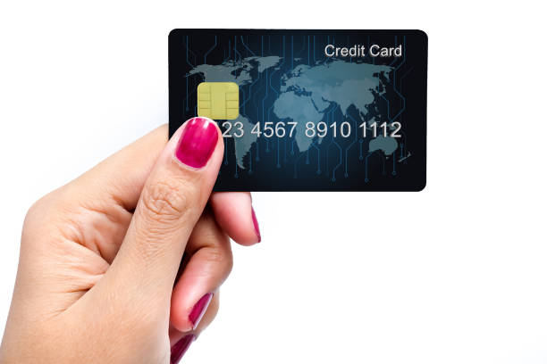 istock Credit Card holded by hand, close up, isolated on a white background 664870966