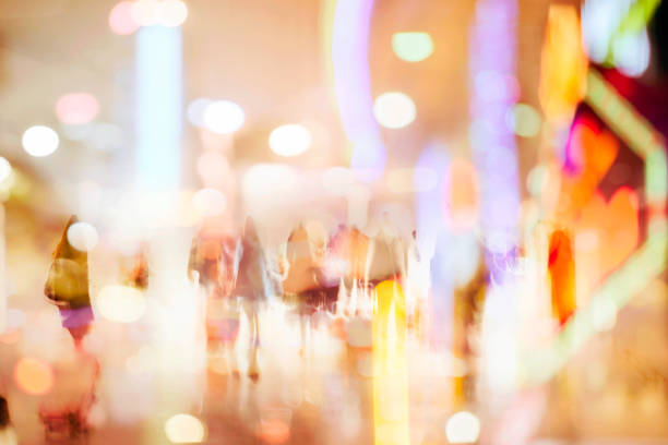 istock people walking at night in modern city 664877540