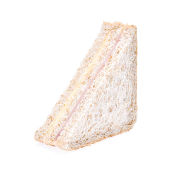 istock Sandwich with ham and cheese isolated on white background 664877794