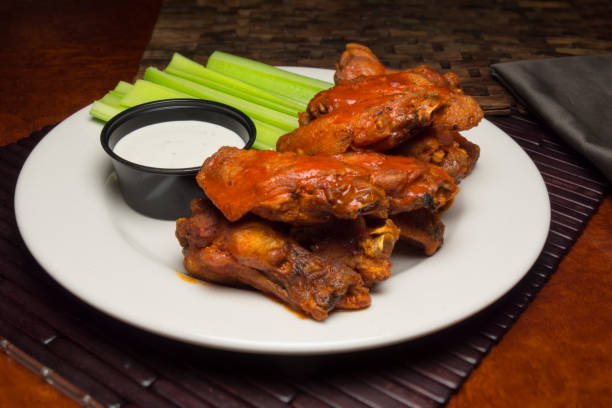 istock BBQ Chicken Wings With Celery And Ranch Dressing 664878304