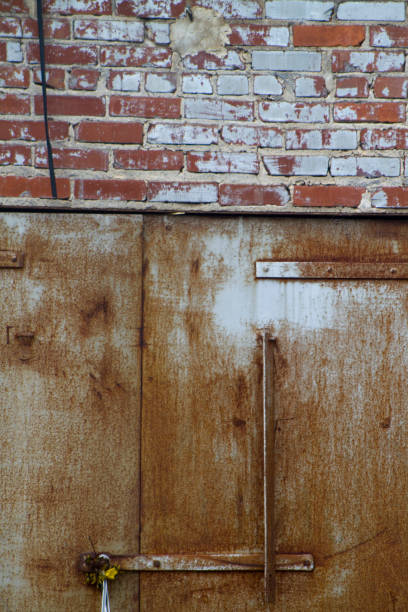 istock Rusty Metal Door Grunge Texture Background 664881390