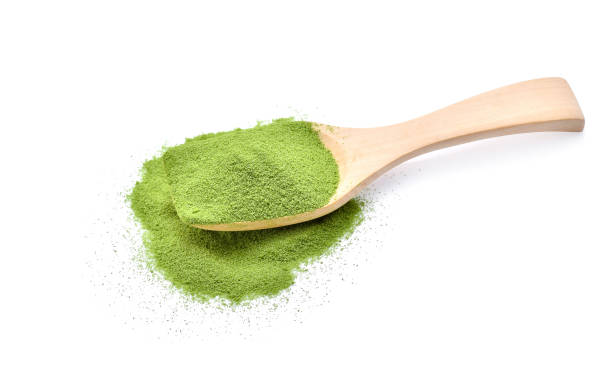istock Powder green tea isolated on white background 664882566