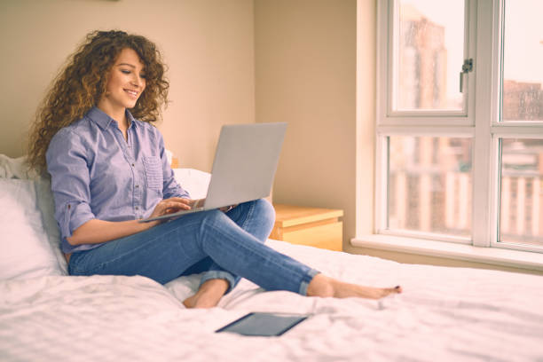 istock Young beautiful woman working at home 664885760