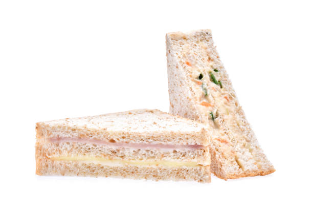 istock sandwich with ham, tuna and vegetables on white background 664885784