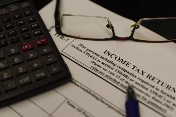 istock Income tax return filing 664888932