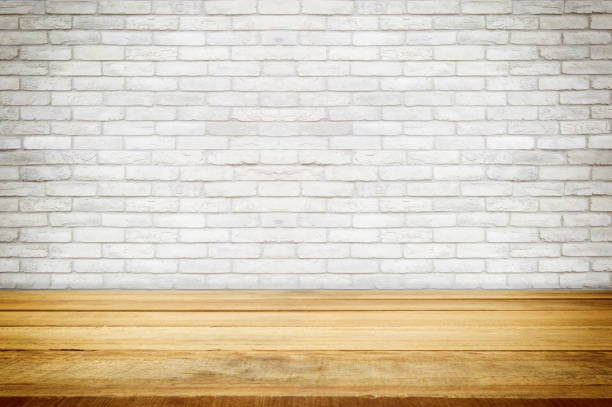 istock wooden shelves on brick concrete wall 664900382