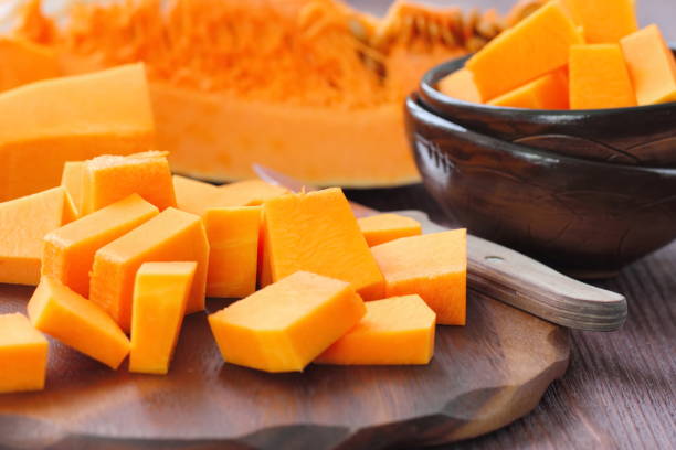 istock Pumpkin on the wooden table 664903860
