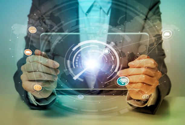 istock woman looks transparent monitor panel that indicates technological graphics, IoT(Internet of Things), ICT(Information Communication Technology), CPS(Cyber-Physical Systems), abstract 664916396