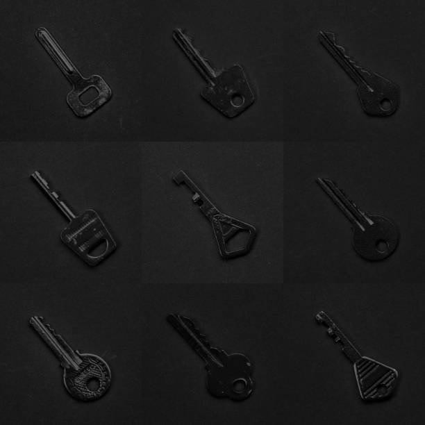 istock Black & white keys collection on black background. Vintage and modern mix 664923348