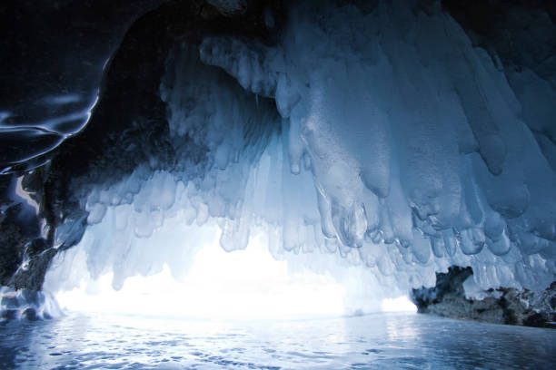 istock ice cave, Lake Baikal. Winter landscape 664923510