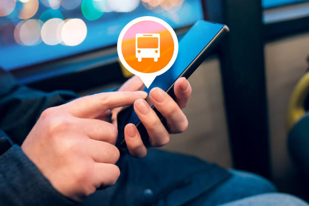 istock Woman using mobile phone app to purchase bus electronic ticket 664927960
