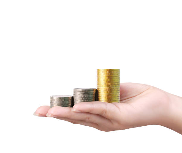 istock money growing from coins in hand 664928546