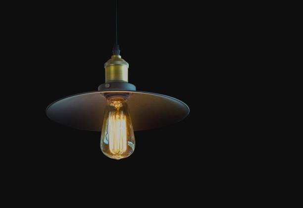 istock Hanging Vintage Lamp Isolated on Black background 664934260