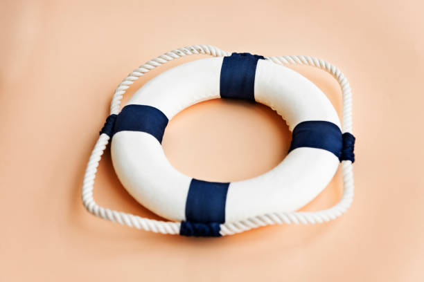 istock Bouy Floatation Assistance Rescue Rope Ring Safe Concept 664950746