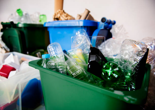 Recyclable Trash with Plastic Glass Bottles and Papers stock photo