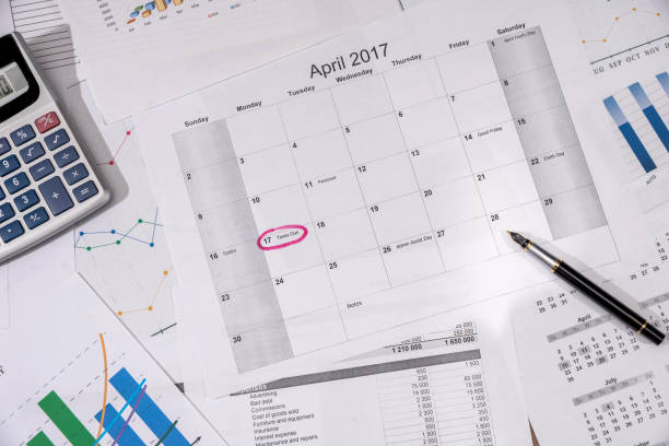 istock 2017 calendar with business graph and calculator 664954396