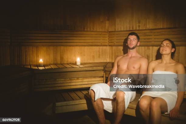 Couple Together In The Sauna Stock Photo - Download Image Now - 20-24 Years, 20-29 Years, Adult