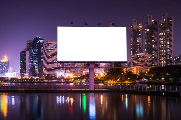 istock Blank billboard with night urban and lake for advertisement 664963536