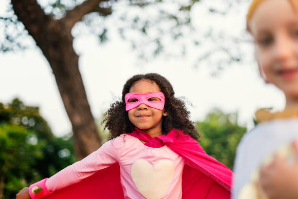 istock Superheroes Cheerful Kids Expressing Positivity Concept 664968206