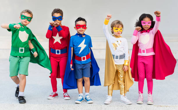 istock Superheroes Cheerful Kids Expressing Positivity Concept 664972472