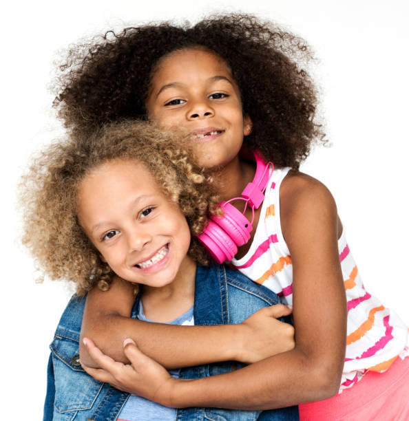 istock Children Smiling Happiness Friendship Togetherness Studio Portrait 664972738