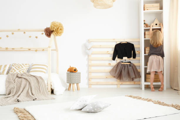 istock Girl playing in her bedroom 664980756