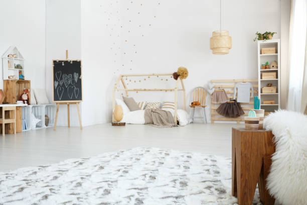 istock Spacious brown and white bedroom 664980770