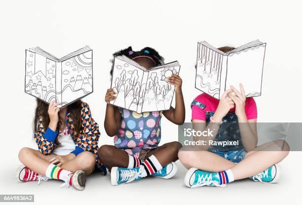 Little Children Reading Story Books Stock Photo - Download Image Now - Child, Reading, Storytelling