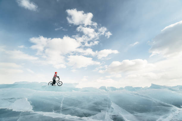 istock Girl on a bmx on ice. 664983686