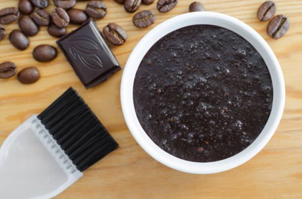 Homemade cocoa (dark chocolate) and ground coffee mask or scrub. Diy cosmetics.