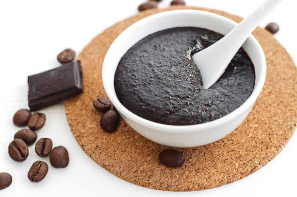 istock Homemade cocoa (dark chocolate) and ground coffee mask or scrub. Diy cosmetics. 664986470