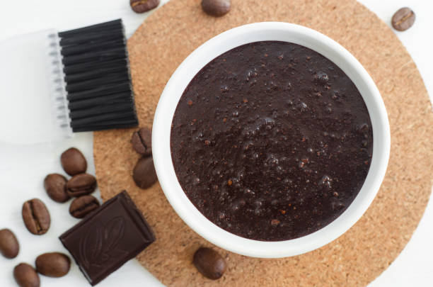 istock Homemade cocoa (dark chocolate) and ground coffee mask or scrub. Diy cosmetics. 664986572