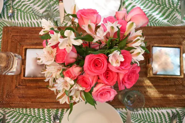 Pink tablesetting with flowers