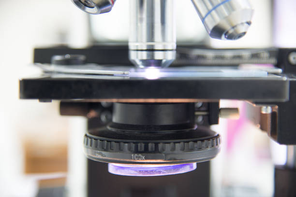 Microscope in medical laboratory analyzing a test sample