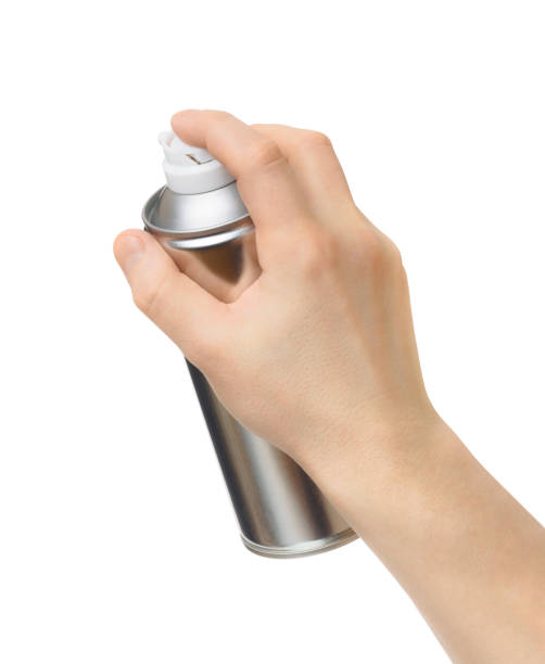 istock spray can in the male hand on white background 665002520