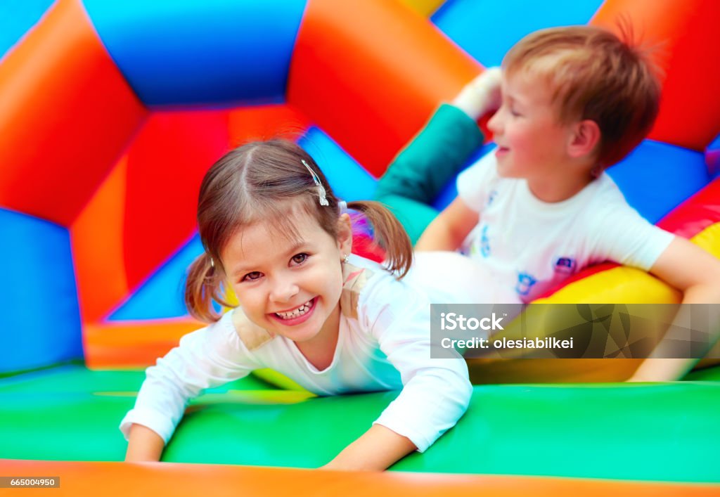happy kids having fun on playground in kindergarten Child Stock Photo