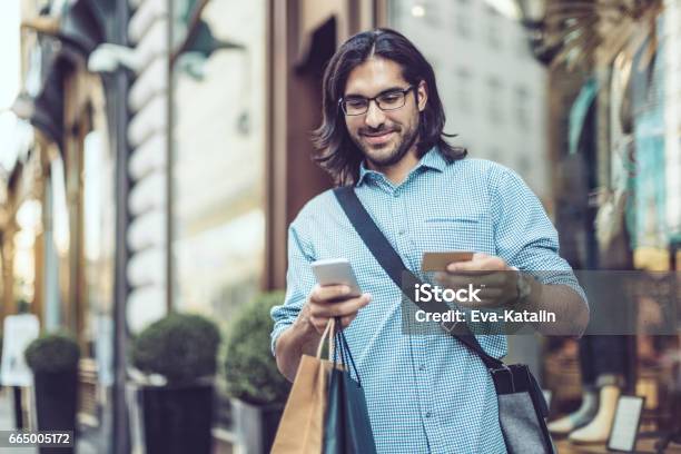Young Businessman Shopping In The City Stock Photo - Download Image Now - Men, Shopping, Credit Card