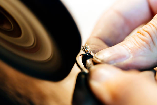 istock Jewelery polishing ring in workshop with adequate tools 665005538