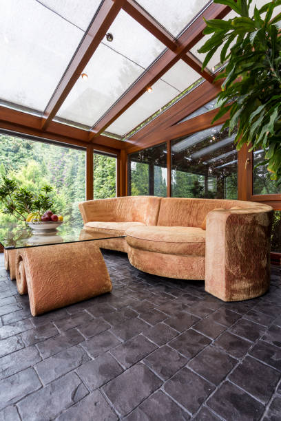 istock Spacious living room with glass roof 665005734