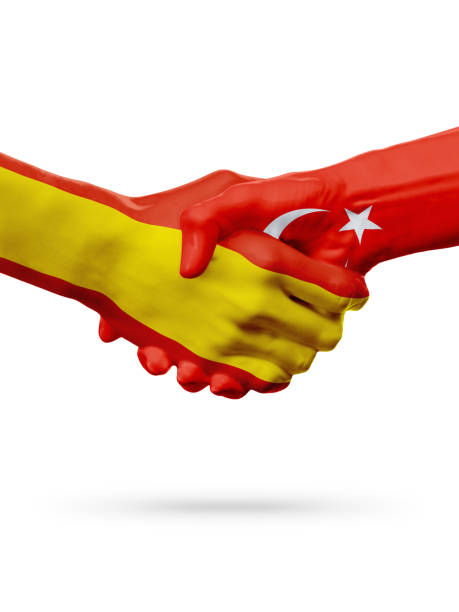 istock Flags Spain, Turkey countries, partnership friendship handshake concept. 665009504