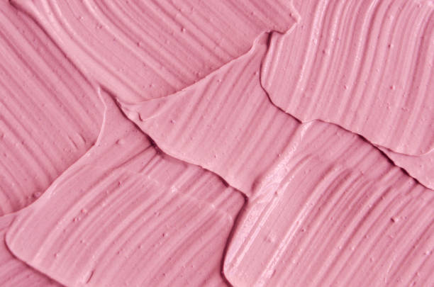 istock Pink cosmetic clay (facial mask, cream) texture close up, selective focus. Abstract background 665010772