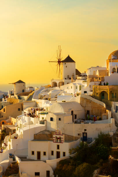 istock windmill of Oia at sunset, Santorini 665024054