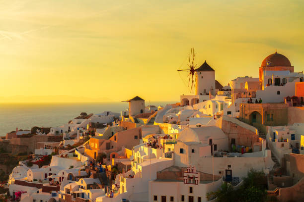 istock windmill of Oia at sunset, Santorini 665024118