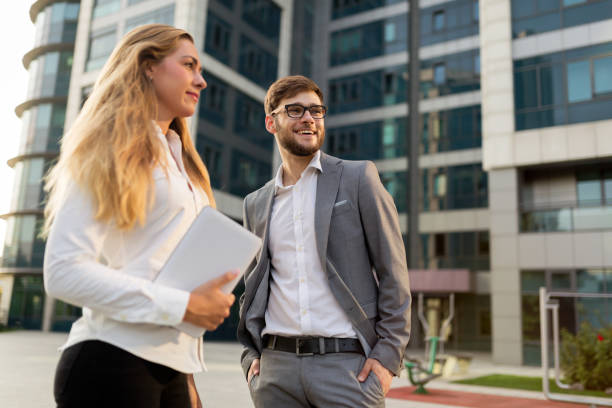istock Business people commuting on street and talking 665025506