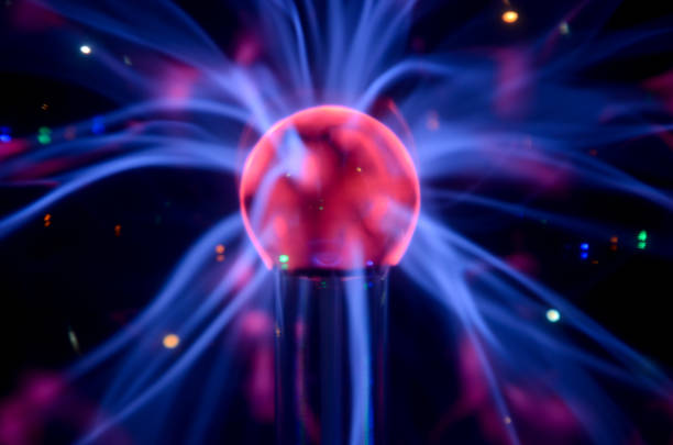 istock Plasma Tesla reactor orb in a dark creating beautiful blue line pattern 665031240