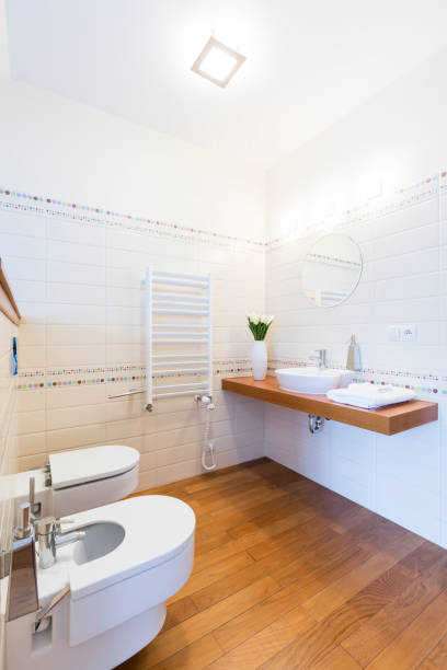 istock Simple bathroom with wooden floor 665032152