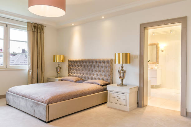 istock Luxurious bedroom interior with a large bed 665037988