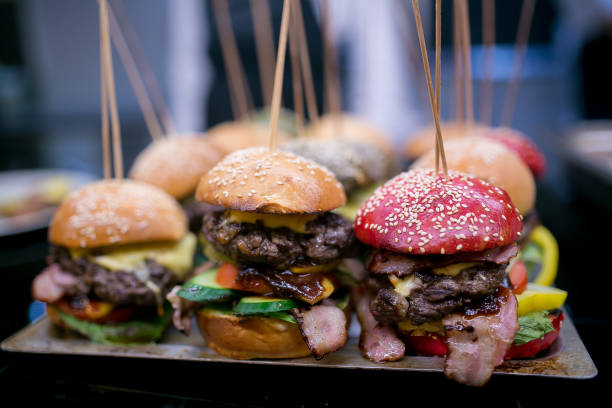 istock Delicious burgers on a tray 665039774